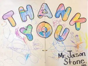 Child's drawing with the words 'THANK YOU' in bold, colorful letters, with additional scribbles and doodles, and 'Mr. Jason Stone' written at the bottom.