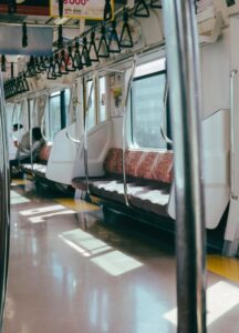 Interior of an empty subway car with bright lighting